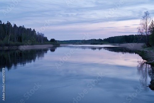 A calm river at twilight, soft reflections, distant forest. The sky transitions from day to night, the river is calm and reflective, the scene is peaceful and serene