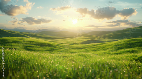 Green meadow with sun shining through puffy clouds, summer landscape