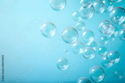 Pale blue background with soap bubbles rising to the surface, blue water, reflective, soap film, water surface