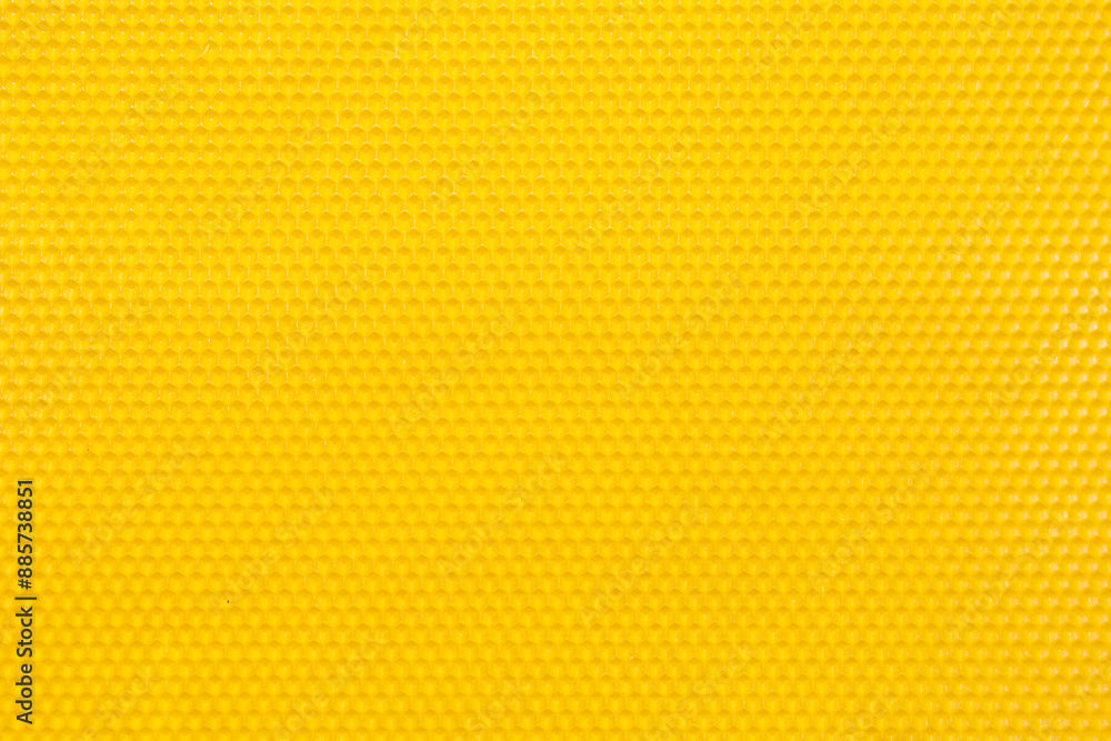 Background of blank made of natural organic beeswax for the production of candles close-up, backdrop Background of blank made of natural organic beeswax for the production of candles close-up, backdrop