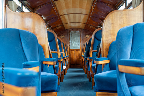 beautiful interior of a steam train passenger carriage, a vintage working steam locomotive train of the Ffestiniog Railway, Porthmadog, Wales photo