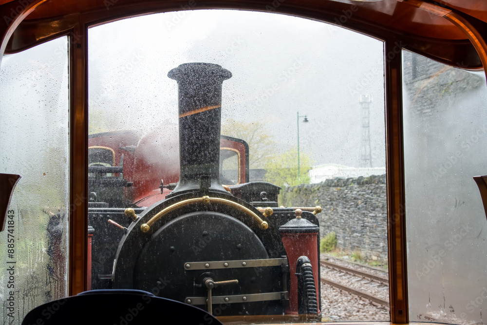 close-up of a red and black steam train, a vintage working steam locomotive train of the Ffestiniog Railway, Porthmadog, Wales close-up of a red and black steam train, a vintage working steam locomotive train of the Ffestiniog Railway, Porthmadog, Wales