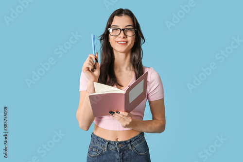 Pretty young woman with not...