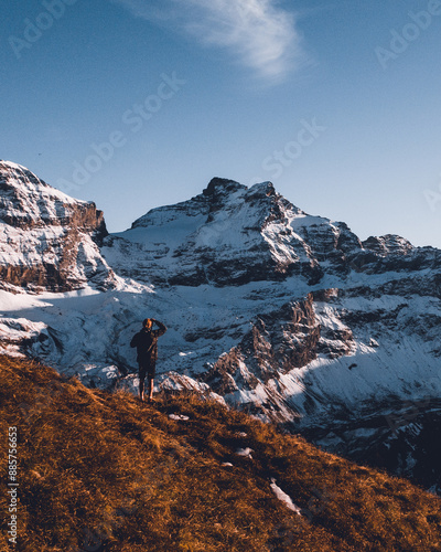 photographer capturing the wild mountain view