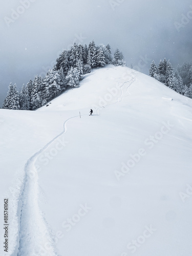 Snowboarder following the first line down the mountain