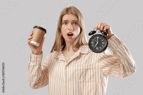 Shocked young woman with al...