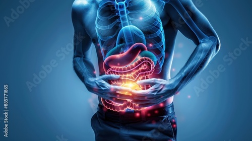 A man is holding his stomach and the stomach is red and inflamed. The image is a representation of the human digestive system and the pain the man is experiencing photo