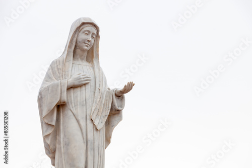 Statue of the Virgin Mary – Queen of Peace on Mount Podbrdo, the Apparition hill overlooking the village of Medjugorje in Bosnia and Herzegovina. photo