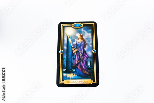 Tarot cards, Waite Rider tarot cards, the queen of swords card in the foreground on a background of available deck cards