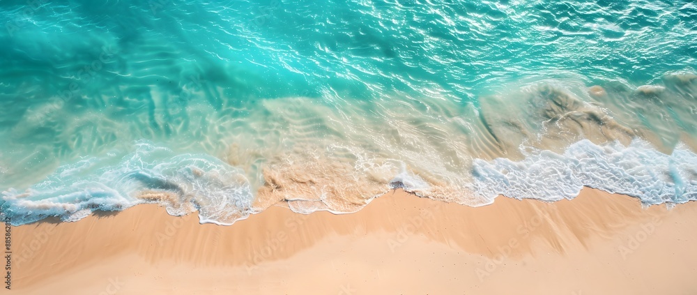 Obraz premium Aerial View of Empty Sandy Beach with Turquoise Water