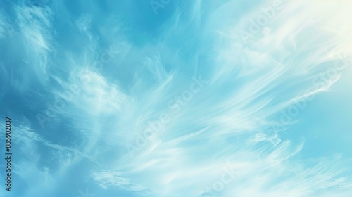 Soft Blue Abstract Background with Gentle Sunlight and Light Blue Sky Featuring White Clouds, Perfect for Design, Banner, or Wallpaper Templates