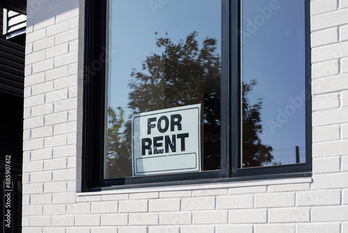 For Rent sign on window of a building window