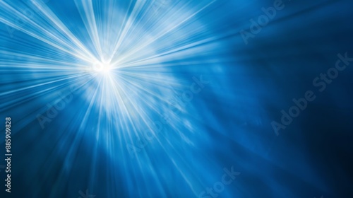 Abstract blue rays of light shining