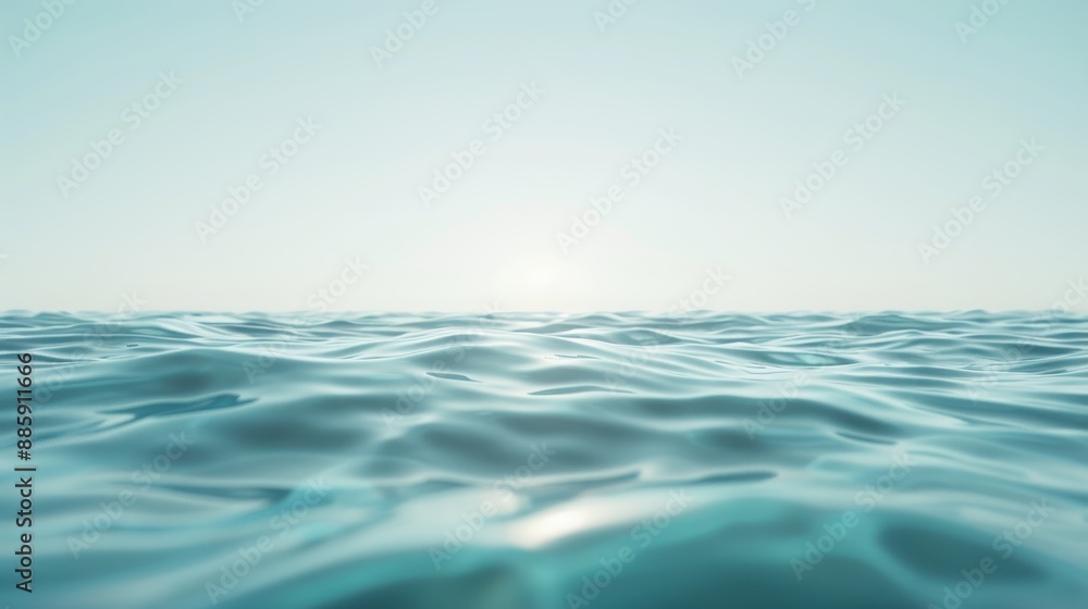Obraz premium A vast ocean with a clear blue sky above it