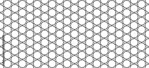 An abstract mosaic tiles design showcasing a jagged texture with elements of gears pattern. Intricate lattice texture. Interlocking paving tiles. 