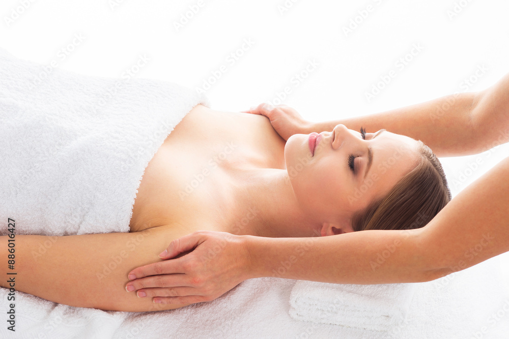 Young woman getting massaging treatment over white. Spa, healthcare and recreation concept. Young woman getting massaging treatment over white. Spa, healthcare and recreation concept.