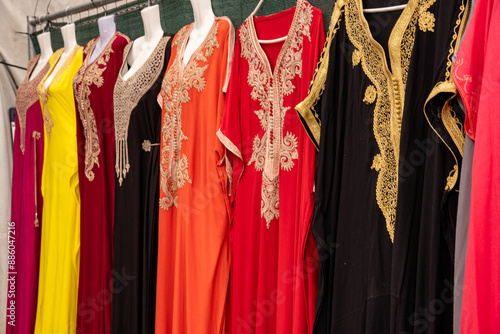 Colorful, richly embroidered Arabic kaftans at a market