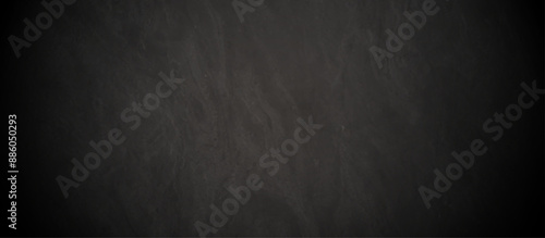 Abstract dark black vintage concrete rough limestone luxurious grunge wall retro chalkboard distressed. rustic sandstone rock black blank stone marble texture backdrop background.