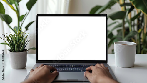 Businessman's hand using a laptop with a transparent screen.