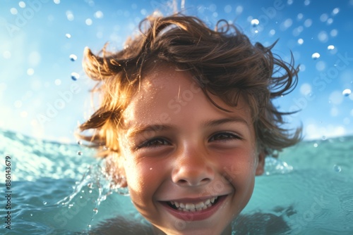 Hispanic boy swimming in an outdoor pool on a day of extreme heat © Hanna Haradzetska