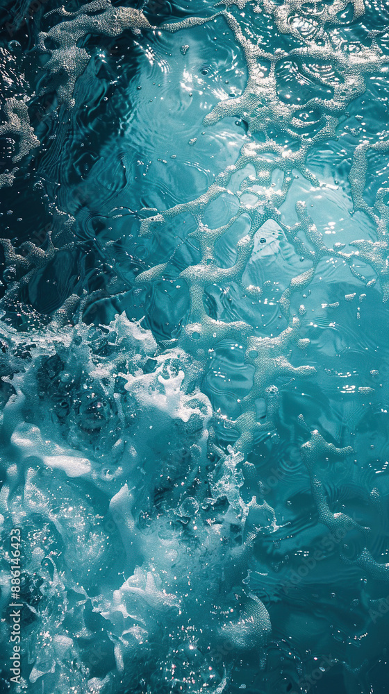 Aerial view of a blue ocean wave breaking with white foam and lots of textures. Vertical background. Generated by artificial intelligence Aerial view of a blue ocean wave breaking with white foam and lots of textures. Vertical background. Generated by artificial intelligence