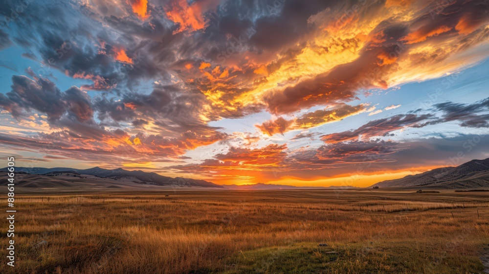 Capture the serenity of a sunset reflecting off altostratus clouds, casting a warm orange glow across the sky as day transitions to night. Capture the serenity of a sunset reflecting off altostratus clouds, casting a warm orange glow across the sky as day transitions to night.