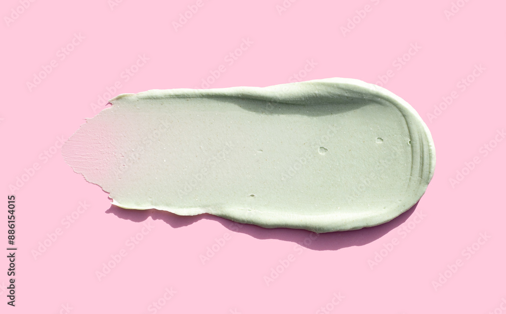 cream texture care cosmetics smear mask peeling green color on pink background skin care concept cream texture care cosmetics smear mask peeling green color on pink background skin care concept