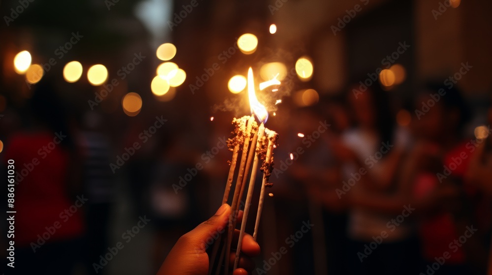 Close up of person with american flag and sparkler celebrating 4th of july independence day Close up of person with american flag and sparkler celebrating 4th of july independence day