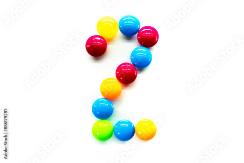 Digit 2 of multicolored rainbow candies isolated on white background. alphabet and numbers