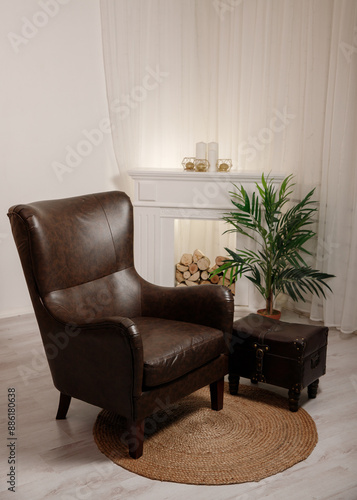 modern living room with armchair and a fireplace