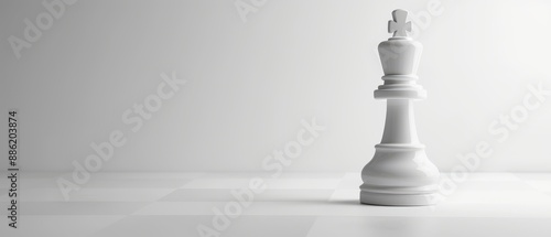 A white chess piece is on a white background