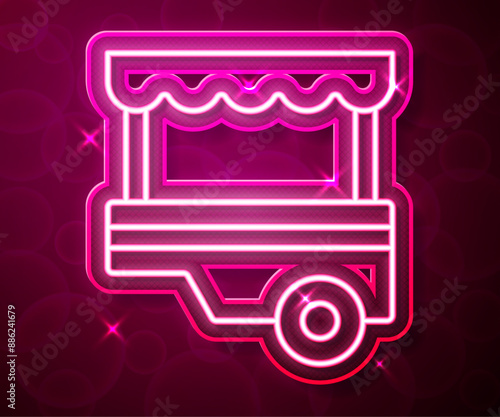 Glowing neon line Fast street food cart with awning icon isolated on red background. Urban kiosk. Vector