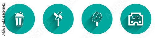 Set Popcorn in cardboard box, Pinwheel toy, Cotton candy and Casino win icon with long shadow. Vector