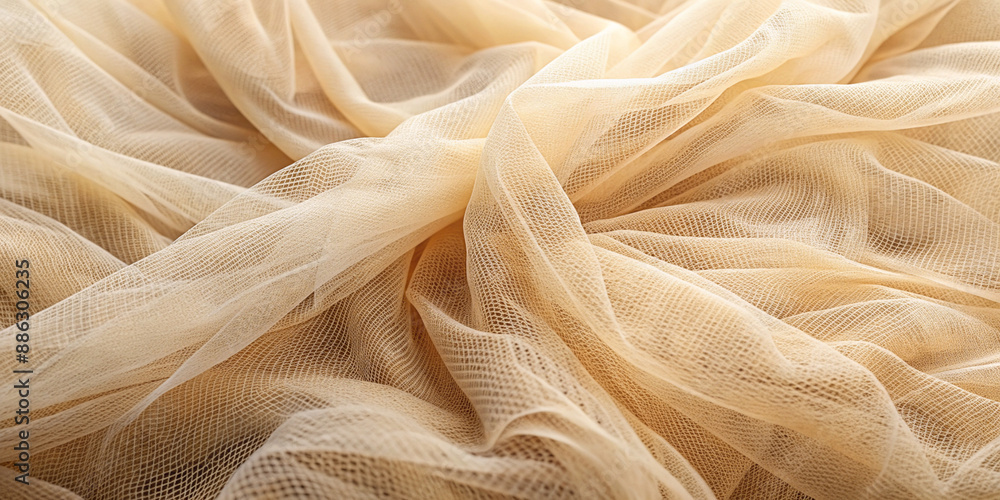 showcases a close-up of a beige veil, revealing its intricate mesh texture. The fabric is soft and light, with gentle folds and creases that create a delicate and elegant appearance showcases a close-up of a beige veil, revealing its intricate mesh texture. The fabric is soft and light, with gentle folds and creases that create a delicate and elegant appearance