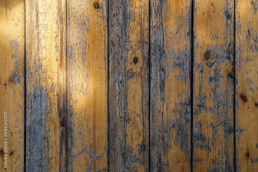 Wooden planks background. Surface texture of wooden planks with chipped varnish Wooden planks background. Surface texture of wooden planks with chipped varnish