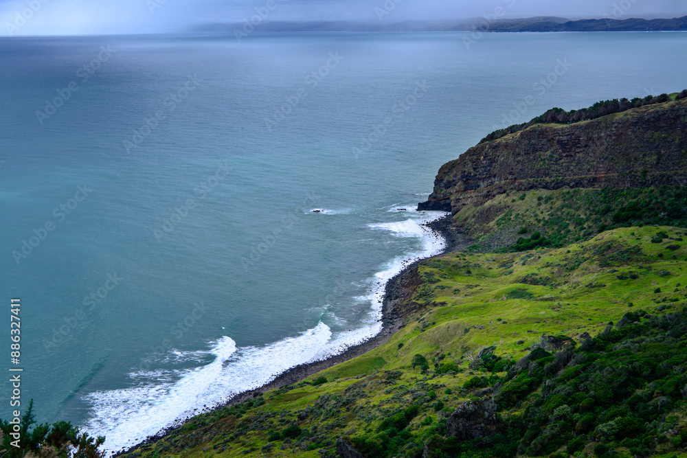 Panoramic view over Te Toto Gorge and Tasman Sea on an overcast summer day. High vantage point. Raglan, New Zealand Panoramic view over Te Toto Gorge and Tasman Sea on an overcast summer day. High vantage point. Raglan, New Zealand