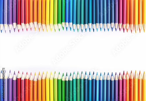 A row of rainbow coloured pencils