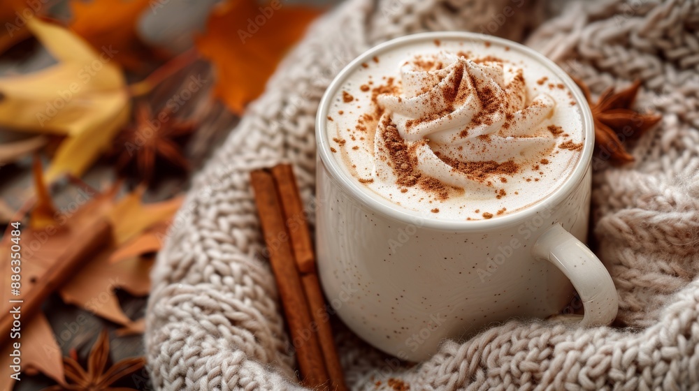 mockup for a fall-themed banner showcasing a pumpkin spice latte in a cozy setting with cinnamon sticks and autumn leaves mockup for a fall-themed banner showcasing a pumpkin spice latte in a cozy setting with cinnamon sticks and autumn leaves