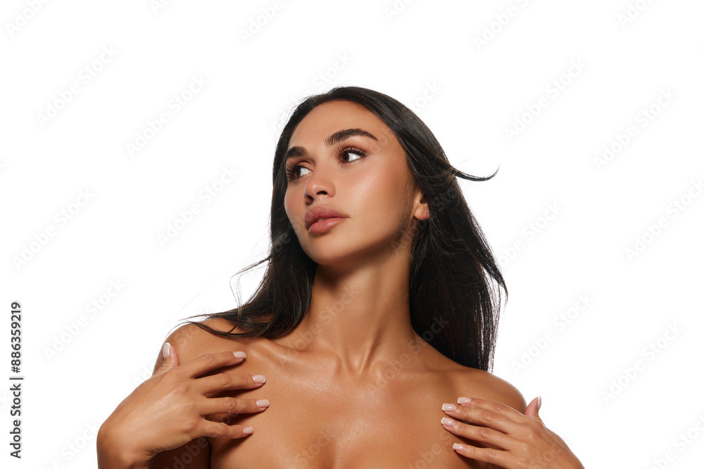 Portrait of beautiful young woman with tanned body, nude makeup and spotless well-kept face, bare shoulders isolated on white background. Beauty, skin and body care, cosmetology and cosmetics concept Portrait of beautiful young woman with tanned body, nude makeup and spotless well-kept face, bare shoulders isolated on white background. Beauty, skin and body care, cosmetology and cosmetics concept