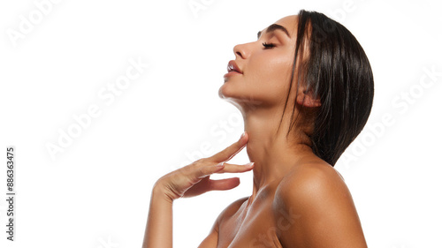 Принти на полотні Beautiful woman with slicked-back hair, eyes closed, hand gently touching neck, bare shoulders, isolated on white background isolated on white background