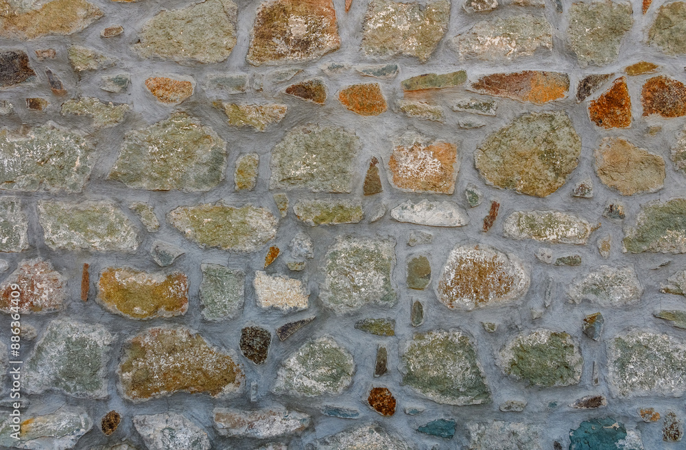 Fototapeta premium Old castle stone wall texture background. Stone wall as a background or texture.