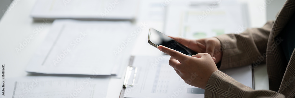 Businesspeople thoughtful using smartphone browsing internet Businesspeople thoughtful using smartphone browsing internet