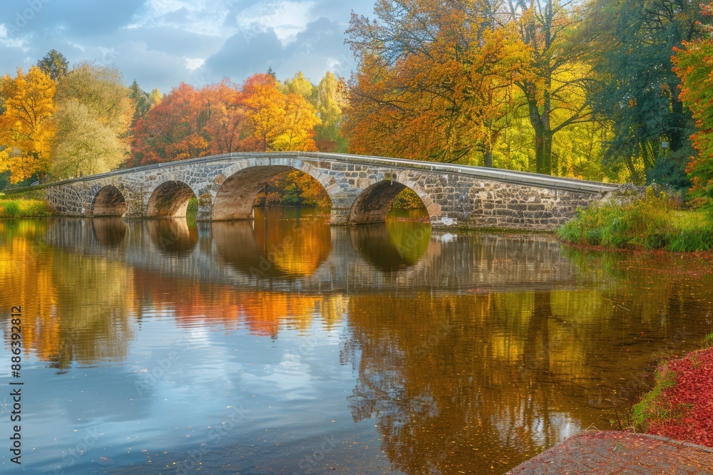 Stone Bridge Over a Tranquil Autumn Lake Stone Bridge Over a Tranquil Autumn Lake