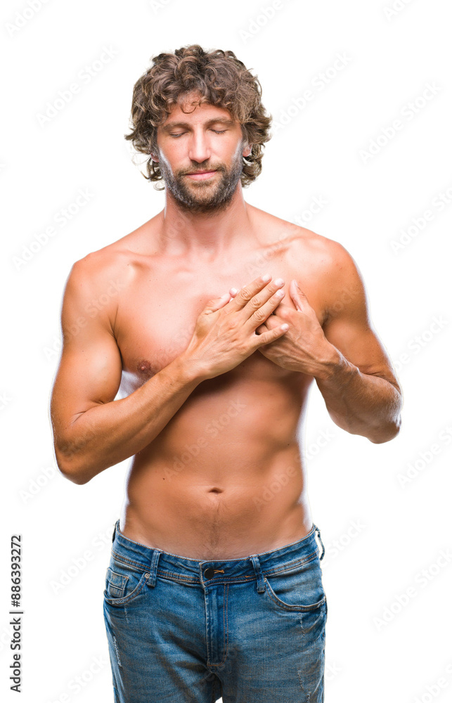 Fototapeta premium Handsome hispanic model man sexy and shirtless over isolated background smiling with hands on chest with closed eyes and grateful gesture on face. Health concept.