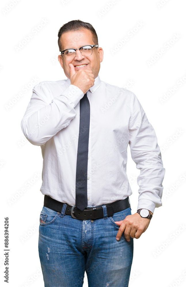 Middle age bussines arab man wearing glasses over isolated background looking confident at the camera with smile with crossed arms and hand raised on chin. Thinking positive. Middle age bussines arab man wearing glasses over isolated background looking confident at the camera with smile with crossed arms and hand raised on chin. Thinking positive.