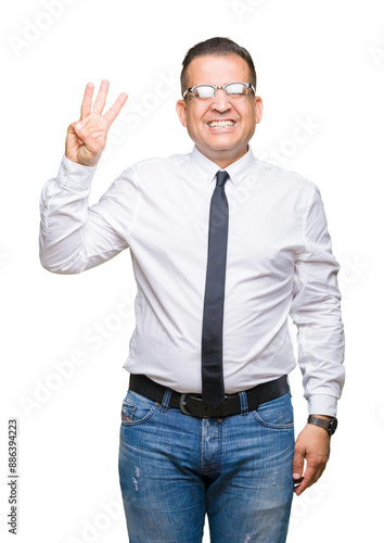 Middle age bussines arab man wearing glasses over isolated background showing and pointing up with fingers number three while smiling confident and happy.