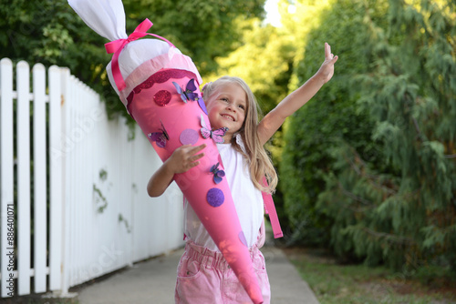 Children with School cone in their hands. First day of school