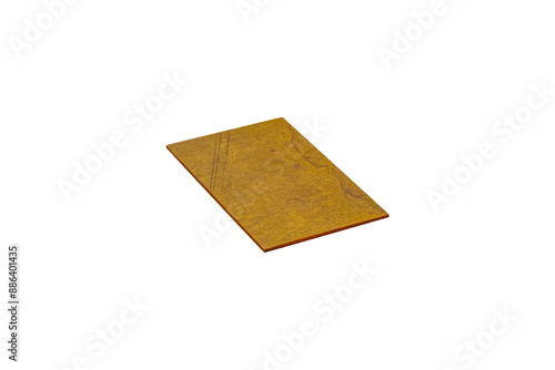 A scratched copper or brass tile is isolated.