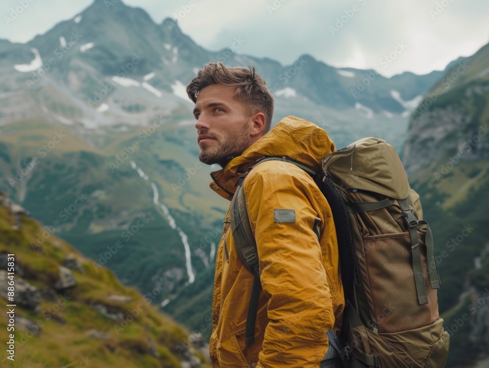 A person stands at the foot of a mountain, wearing a backpack and preparing for an adventure A person stands at the foot of a mountain, wearing a backpack and preparing for an adventure