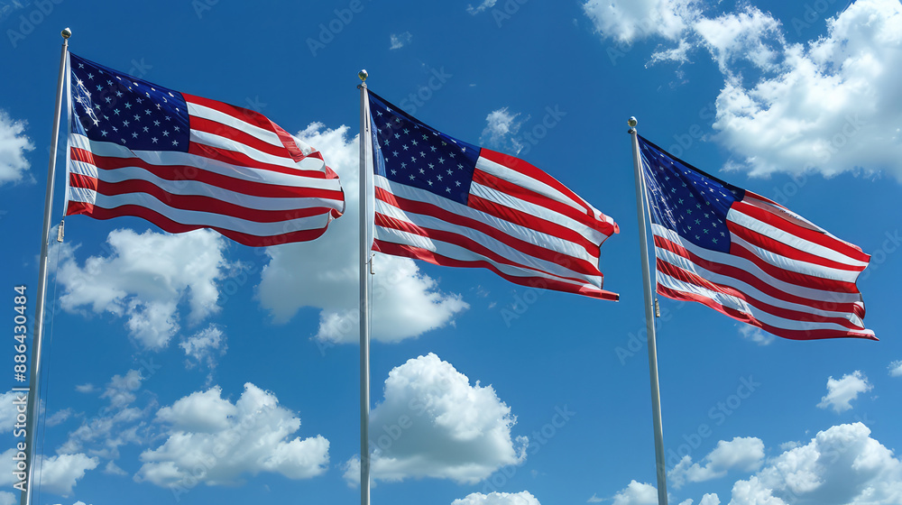 closeup of three american flags with blue cloudy sky closeup of three american flags with blue cloudy sky